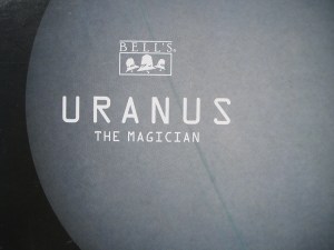 Image of gray uranus on beer box.